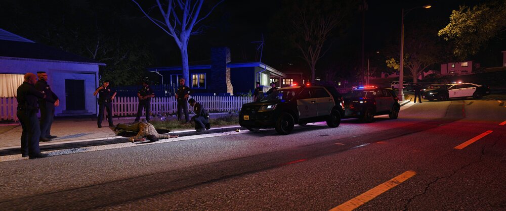 Could contain: outdoor, road, vehicle, tree, land vehicle, street, night, car, wheel, street light, electricity, road surface, light, ground, people, city, parked, winter