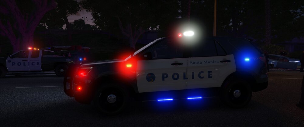 Could contain: vehicle, land vehicle, outdoor, transport, wheel, road, text, vehicle registration plate, auto part, car, automotive lighting, tire, automotive tail & brake light, street, night, police, light