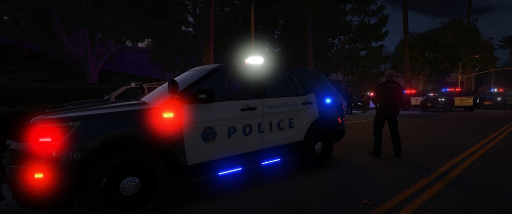 Could contain: vehicle, land vehicle, outdoor, transport, wheel, road, emergency service, car, emergency vehicle, automotive tail & brake light, law enforcement, automotive lighting, light, night, street, police