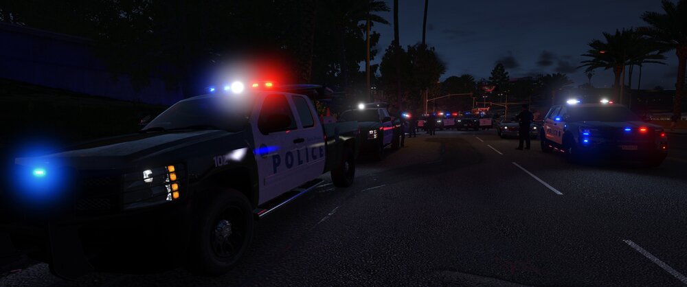 Could contain: vehicle, land vehicle, outdoor, wheel, sky, car, tire, road, transport, auto part, tree, truck, motor vehicle, automotive exterior, automotive lighting, night, street, police, light, parked