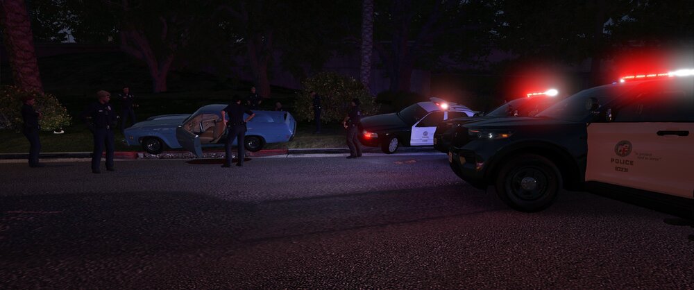 Could contain: outdoor, land vehicle, vehicle, wheel, tree, tire, transport, road, auto part, truck, ground, night, street, people, parked, light