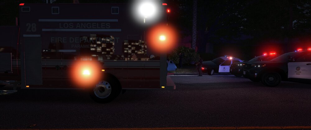 Could contain: vehicle, land vehicle, outdoor, transport, wheel, road, light, night, truck, street, fire, parked, city