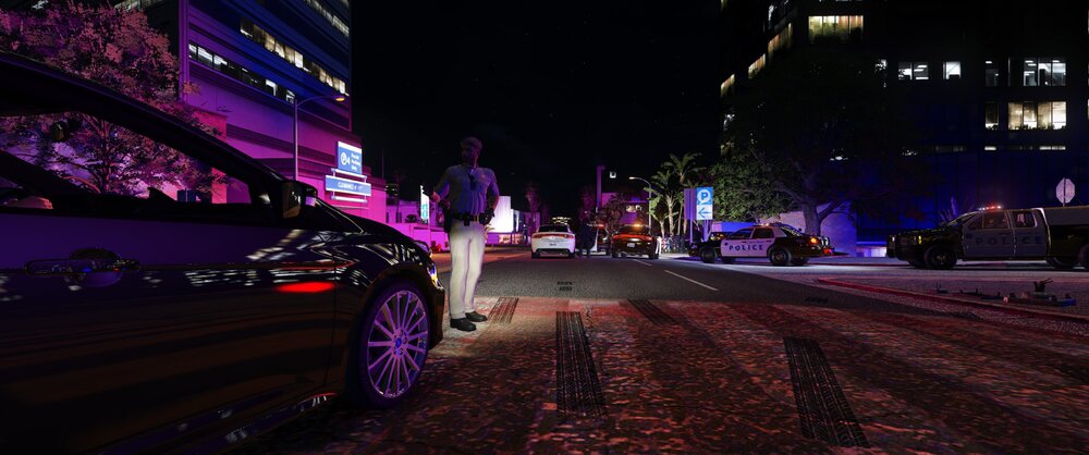 Could contain: outdoor, land vehicle, vehicle, car, wheel, road, purple, light, street, night, ground
