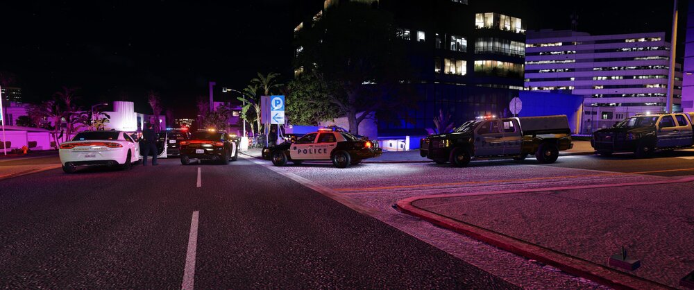 Could contain: outdoor, vehicle, land vehicle, building, road, car, street, sky, night, wheel, tree, truck, street light, light, city, ground, parked