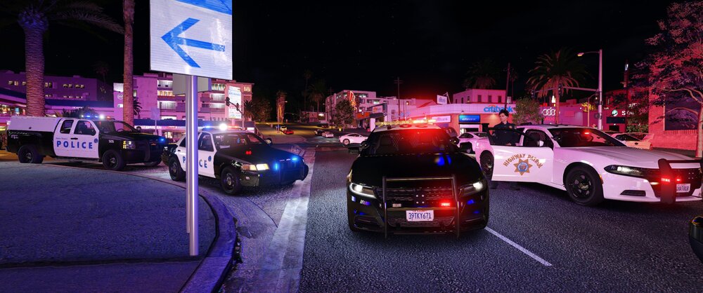 Could contain: vehicle, land vehicle, outdoor, text, wheel, road, vehicle registration plate, street, building, automotive tail & brake light, automotive lighting, transport, tire, light, police, city, parked, night, car