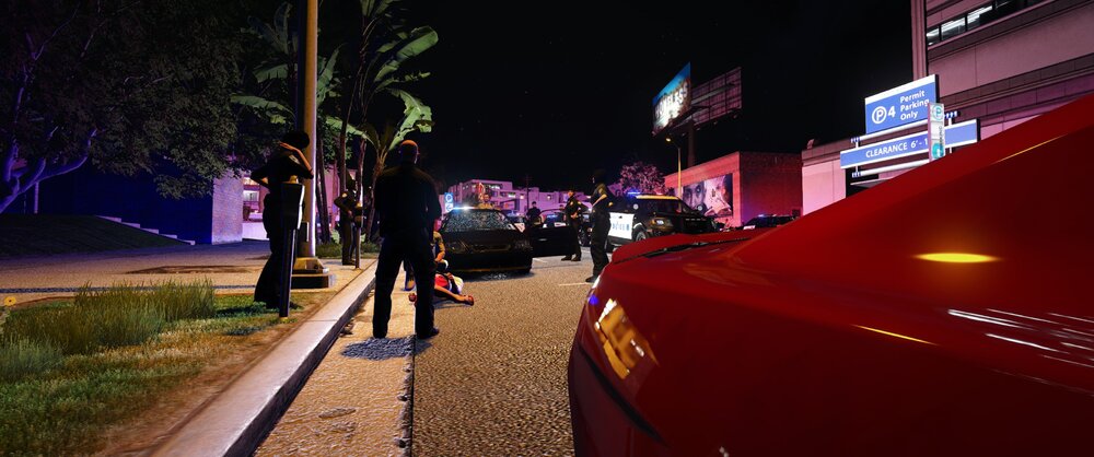 Could contain: outdoor, vehicle, land vehicle, car, ground, light, street, night, parked