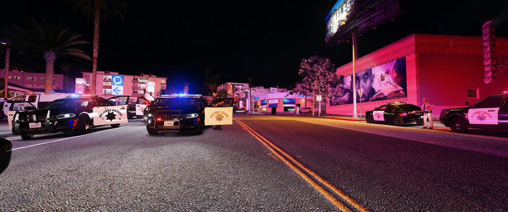 Could contain: outdoor, road, vehicle, land vehicle, street, building, sky, wheel, car, road surface, light, night, city, truck, ground
