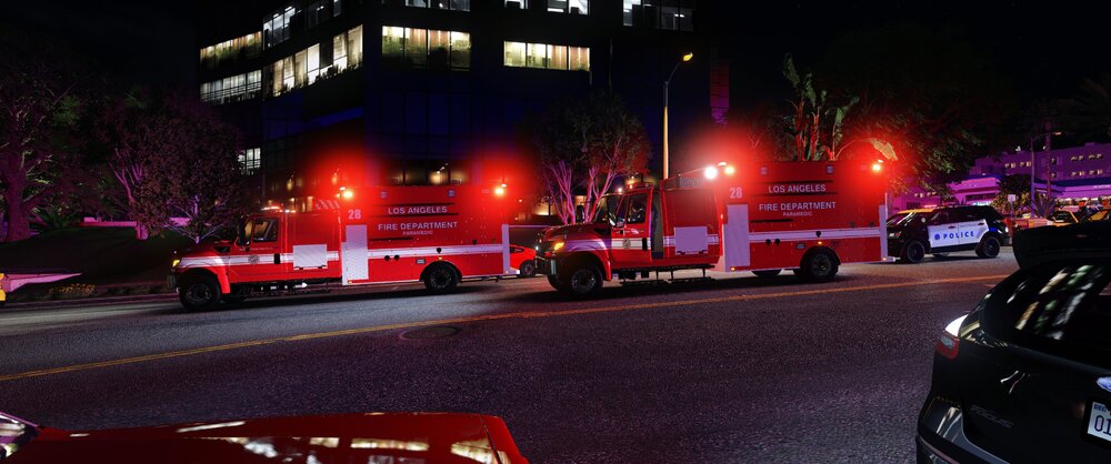 Could contain: vehicle, land vehicle, outdoor, firefighter, wheel, car, road, fire, emergency service, emergency vehicle, emergency, building, light, night, street, truck, red, parked, city, ambulance