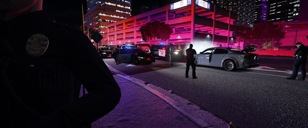 Could contain: building, vehicle, land vehicle, wheel, outdoor, car, road, street, ground, night, person, city, light