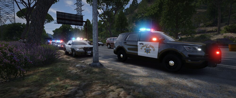 Could contain: outdoor, vehicle, land vehicle, wheel, tree, transport, road, tire, vehicle registration plate, text, auto part, truck, automotive exterior, automotive tail & brake light, automotive lighting, plant, street, light, ground, car, police