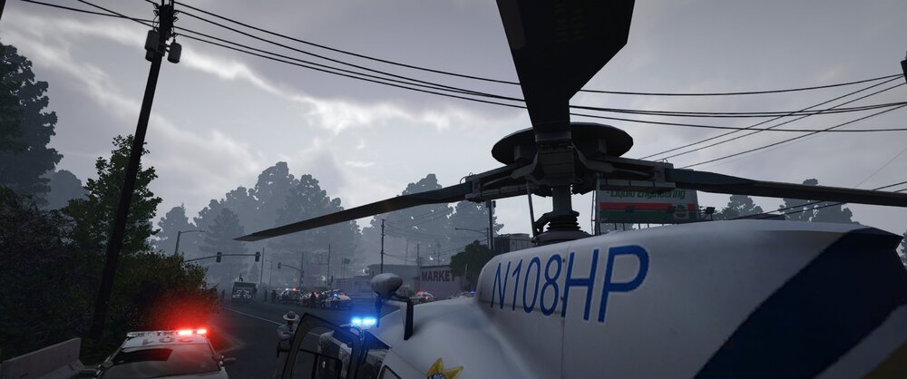 Could contain: outdoor, sky, transport, vehicle, tree, helicopter, snow, street, light, ski tow