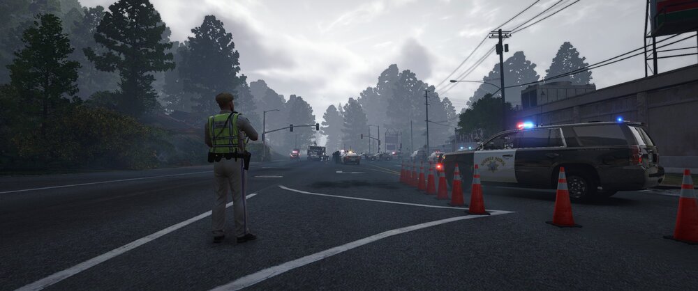 Could contain: outdoor, road, sky, tree, cloud, road surface, lane, asphalt, vehicle, thoroughfare, firefighter, street, way, person