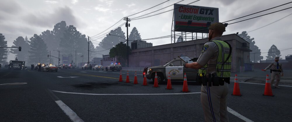 Could contain: sky, outdoor, road, cloud, clothing, person, street, firefighter, asphalt, road surface