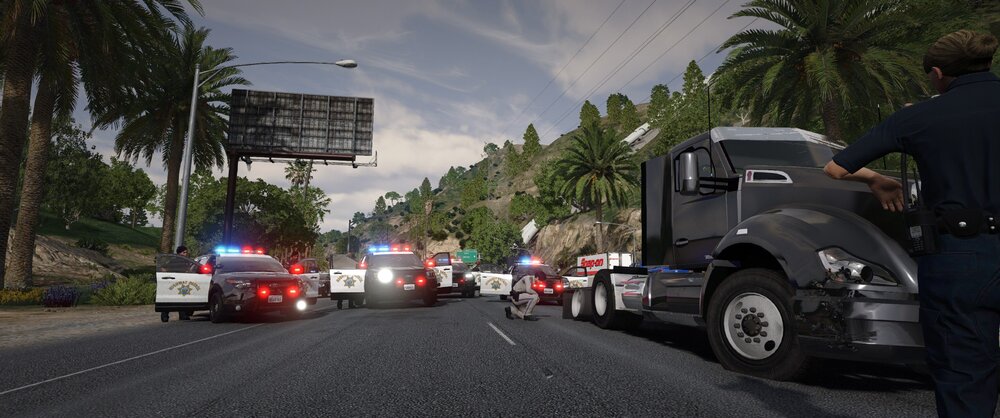 Could contain: outdoor, sky, vehicle, wheel, land vehicle, road, tire, man, tree, auto part, person, car, motor vehicle, asphalt, road surface, vehicle registration plate, street, cloud, clothing, automotive exterior, truck, people