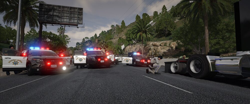 Could contain: outdoor, vehicle, land vehicle, wheel, road, sky, text, tree, transport, auto part, firefighter, road surface, asphalt, emergency service, tire, street, tarmac, vehicle registration plate, car, emergency, police, truck, light, ground