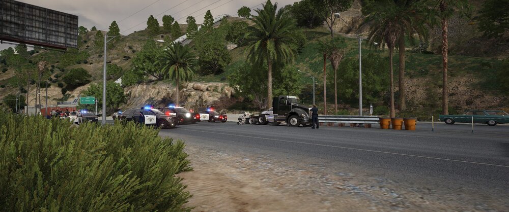 Could contain: outdoor, tree, sky, road, thoroughfare, road surface, land vehicle, asphalt, vehicle, wheel, motorcycle, people, ground, way, street, travel