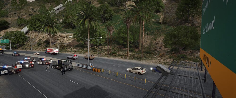 Could contain: outdoor, road, vehicle, car, land vehicle, tree, asphalt, thoroughfare, lane, wheel, road surface, way, street, roadway