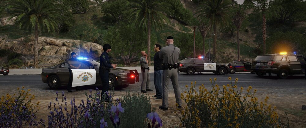 Could contain: outdoor, land vehicle, tree, vehicle, car, plant, wheel, road, truck, flower, tire, man, person, standing, ground