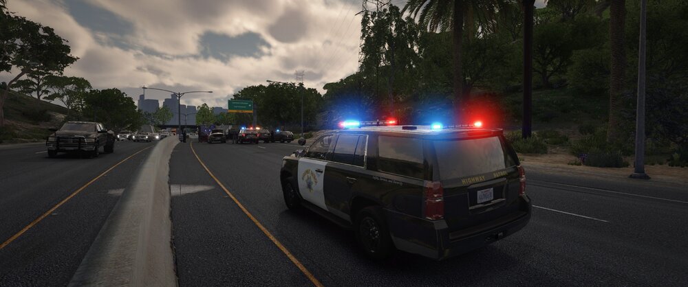 Could contain: outdoor, vehicle, land vehicle, road, sky, wheel, tree, transport, automotive exterior, auto part, tire, cloud, motor vehicle, automotive tail & brake light, street, automotive lighting, vehicle registration plate, asphalt, tarmac, light, driving, ground, car