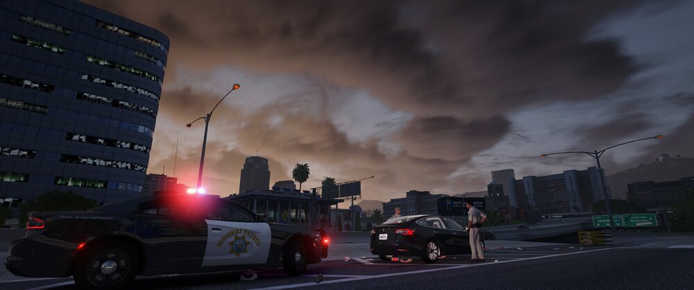 Could contain: cloud, outdoor, sky, vehicle, land vehicle, wheel, car, road, building, tire, street, truck, city, light, night, cloudy