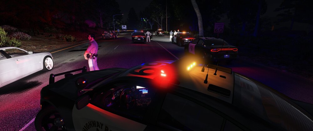 Could contain: vehicle, land vehicle, outdoor, light, street, night, car