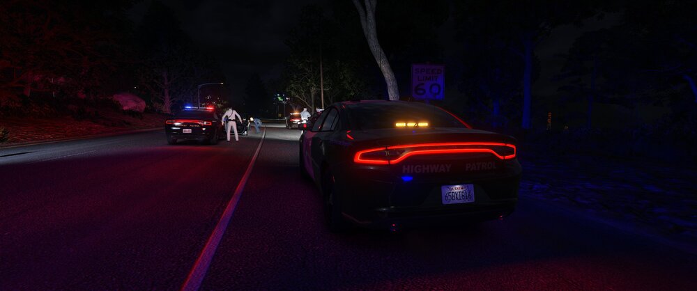 Could contain: vehicle, outdoor, land vehicle, road, car, automotive lighting, automotive tail & brake light, night, street, light