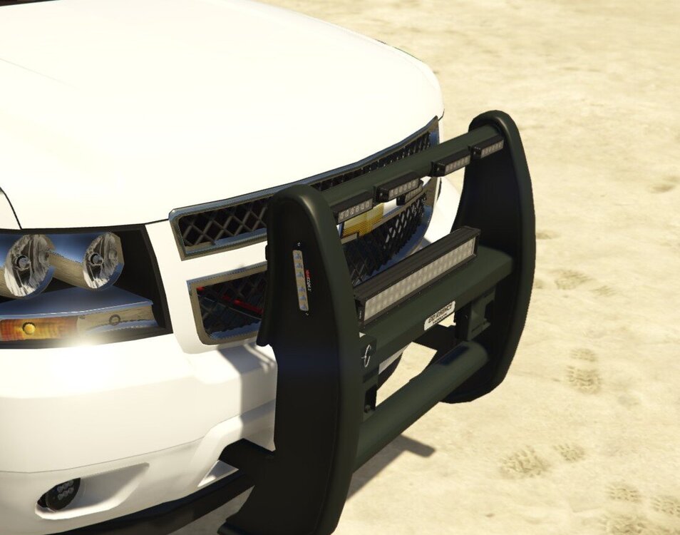 Could contain: vehicle, bumper, ground, car, land vehicle, auto part, outdoor, automotive exterior, automotive design, motor vehicle, automotive lighting, automotive light bulb, grille, white, parked, floor