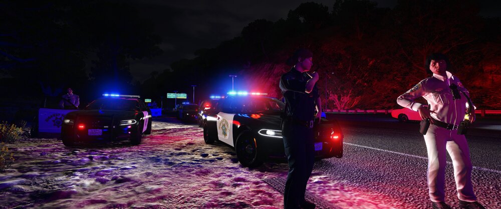 Could contain: outdoor, vehicle, land vehicle, clothing, ground, car, person, light, night, standing