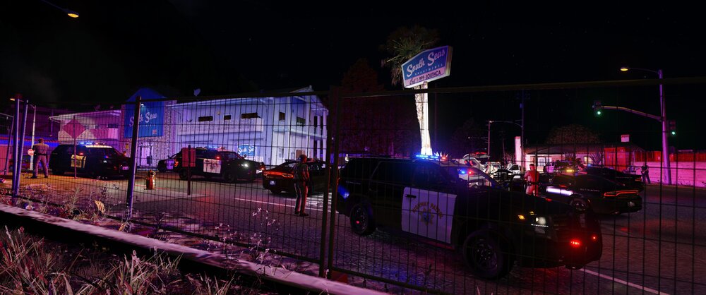 Could contain: outdoor, night, building, street light, land vehicle, vehicle, sky, light, electricity, car, street, city, parked