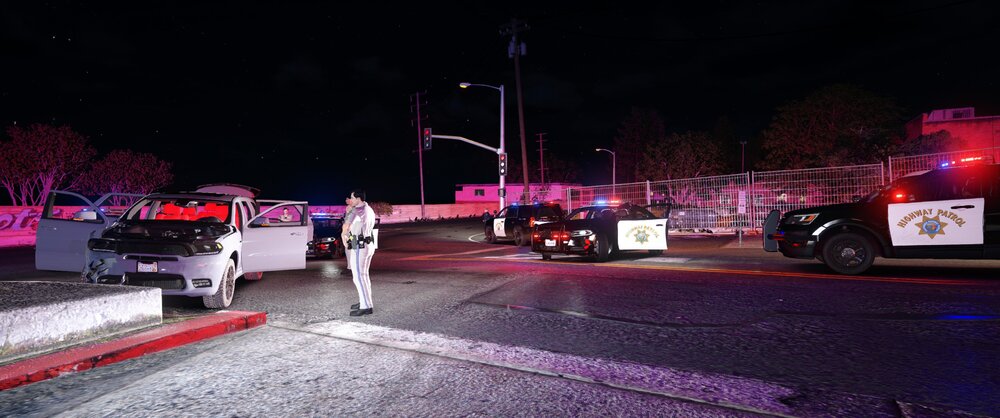 Could contain: outdoor, vehicle, road, land vehicle, car, night, street, street light, sky, wheel, light, tree, electricity, ground, parked