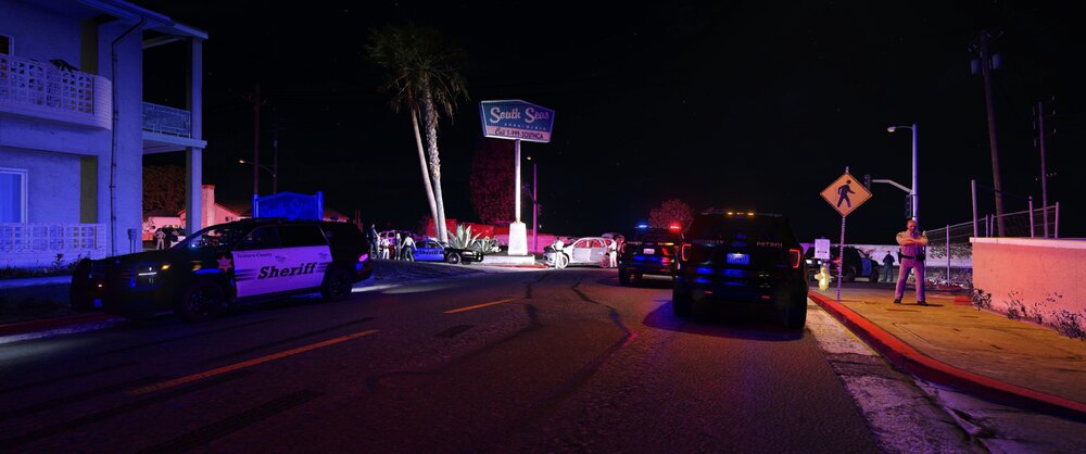 Could contain: outdoor, road, sky, vehicle, car, land vehicle, street, street light, night, building, wheel, light, electricity, road surface, way, sign