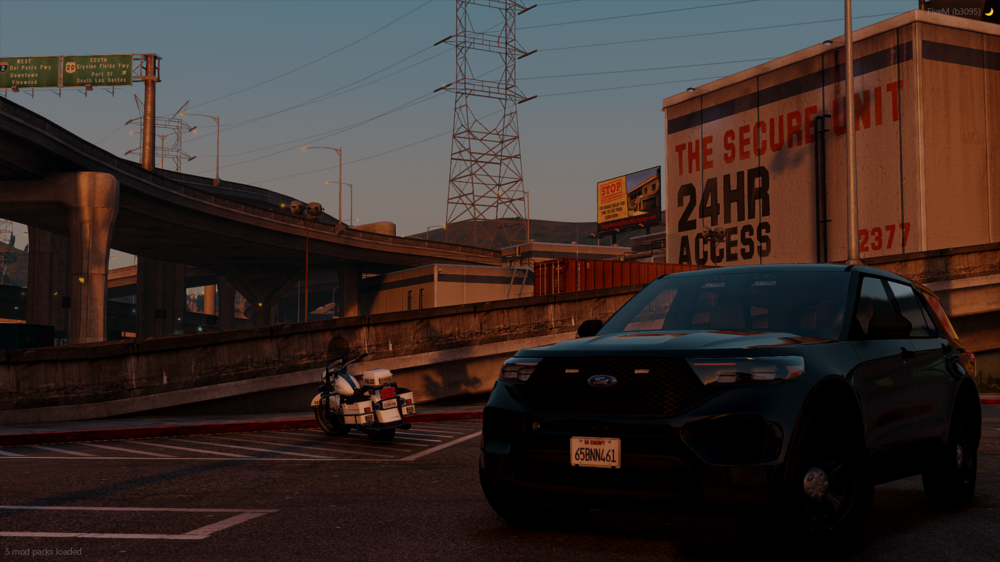 Could contain: land vehicle, vehicle, outdoor, sky, wheel, building, tire, car, text, road, auto part, vehicle registration plate, sport utility vehicle, family car, automotive exterior, street, driving