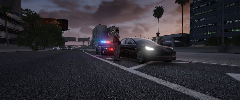 Could contain: outdoor, sky, vehicle, land vehicle, road, cloud, wheel, road surface, ground, automotive lighting, street light, street, car, way, light, night