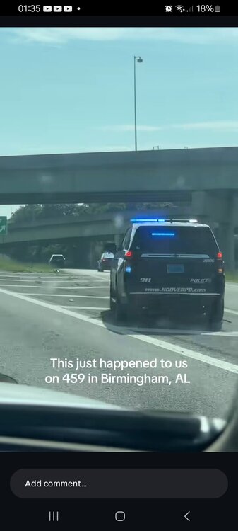 Could contain: text, vehicle, land vehicle, car, screenshot, windshield, outdoor, wheel, road