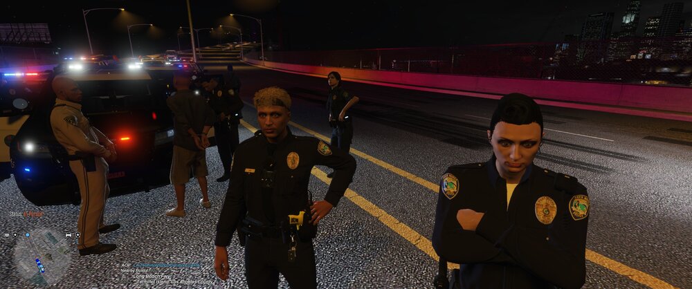 Could contain: clothing, man, person, outdoor, road, ground, street, people, officer