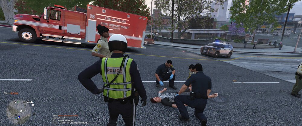 Could contain: outdoor, clothing, firefighter, vehicle, land vehicle, emergency service, road, man, person, emergency, emergency vehicle, tree, fire department, footwear, wheel, fire apparatus, rescue, transport, fire, street, truck, people