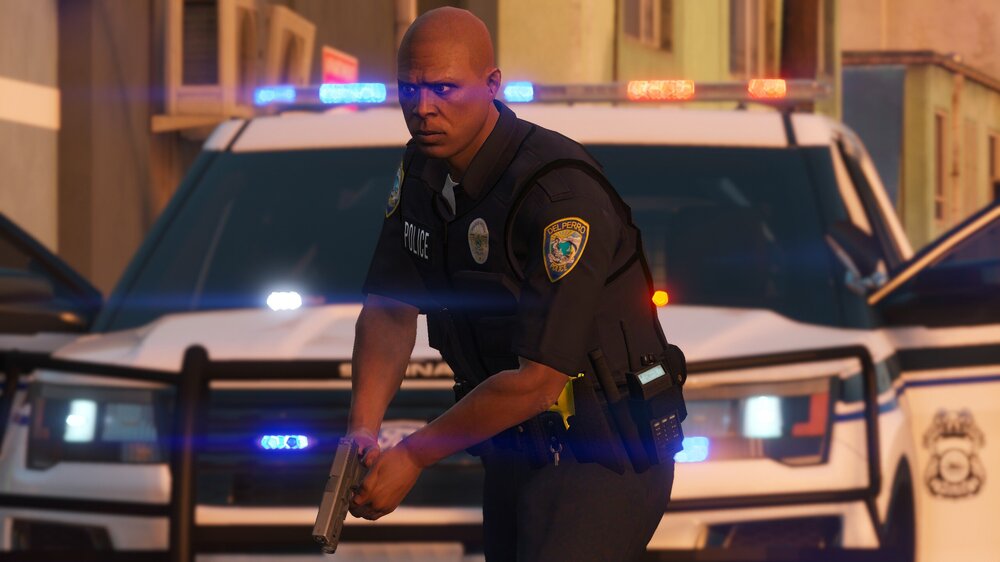 Could contain: vehicle, land vehicle, person, clothing, law enforcement, man, police, car, wheel, officer, police officer, emergency service, outdoor, uniform