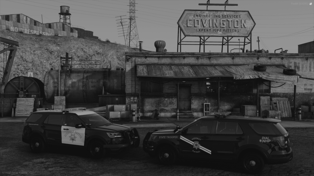 Could contain: outdoor, building, black and white, vehicle, wheel, land vehicle, sky, billboard, tire, car, monochrome, black, parked, sign, street