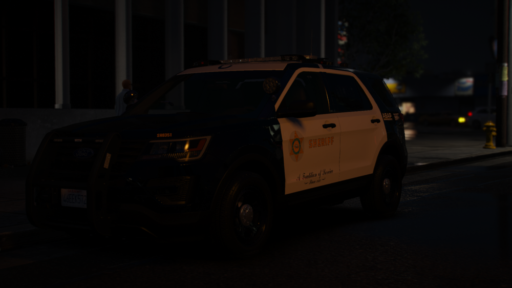 Could contain: vehicle, land vehicle, wheel, outdoor, tire, road, auto part, transport, street, car, night, dark