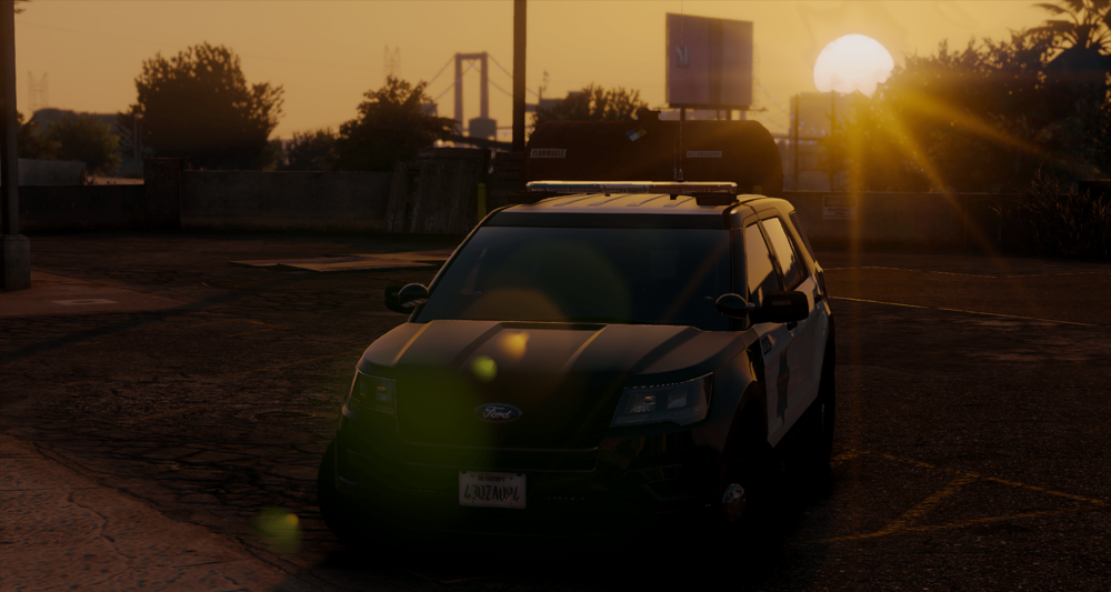 Could contain: outdoor, vehicle, land vehicle, sky, wheel, car, sunset, tire, transport, ground, street, sun, light