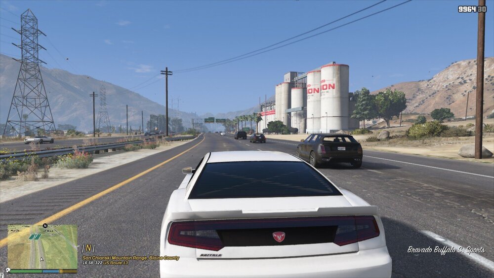 Could contain: outdoor, land vehicle, vehicle, sky, wheel, road, text, tire, vehicle registration plate, auto part, truck, automotive tail & brake light, mountain, highway, street, driving, car