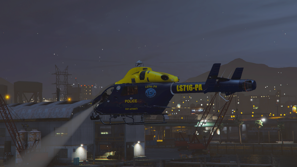 Could contain: sky, outdoor, transport, aircraft, vehicle, plane, helicopter, building, helicopter rotor, aviation, night, light