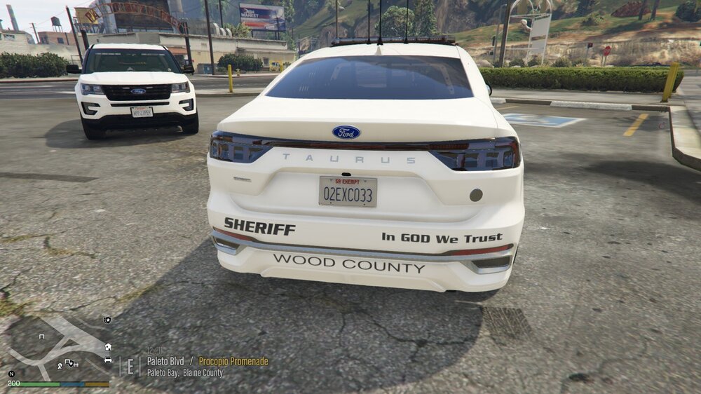 Could contain: text, vehicle, land vehicle, outdoor, wheel, vehicle registration plate, tire, ground, auto part, bumper, mid-size car, subaru, automotive design, road, full-size car, family car, automotive tail & brake light, car, parked, street