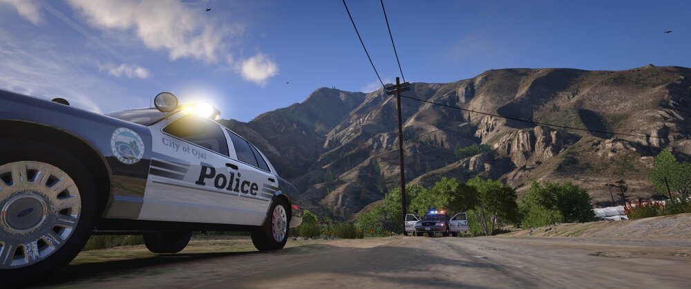 Could contain: outdoor, sky, wheel, tire, land vehicle, vehicle, auto part, road, mountain, car, cloud, automotive tire, ground, parked