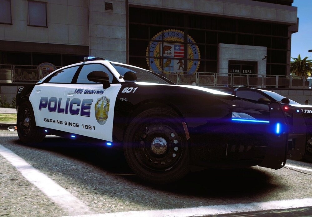 Could contain: land vehicle, vehicle, wheel, transport, outdoor, text, tire, sports car, automotive design, car, road, performance car, auto part, sports sedan, full-size car, police, street, parked