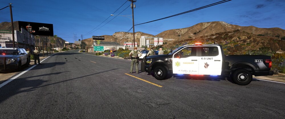 Could contain: outdoor, sky, land vehicle, wheel, road, tire, motor vehicle, truck, car, auto part, vehicle registration plate, asphalt, text, mode of transport, van, street, mountain, way, parked, vehicle