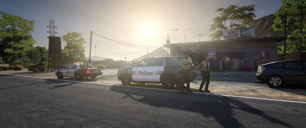 Could contain: outdoor, land vehicle, sky, vehicle, road, wheel, tree, street, road surface, vehicle registration plate, car, ground, sun, person, people