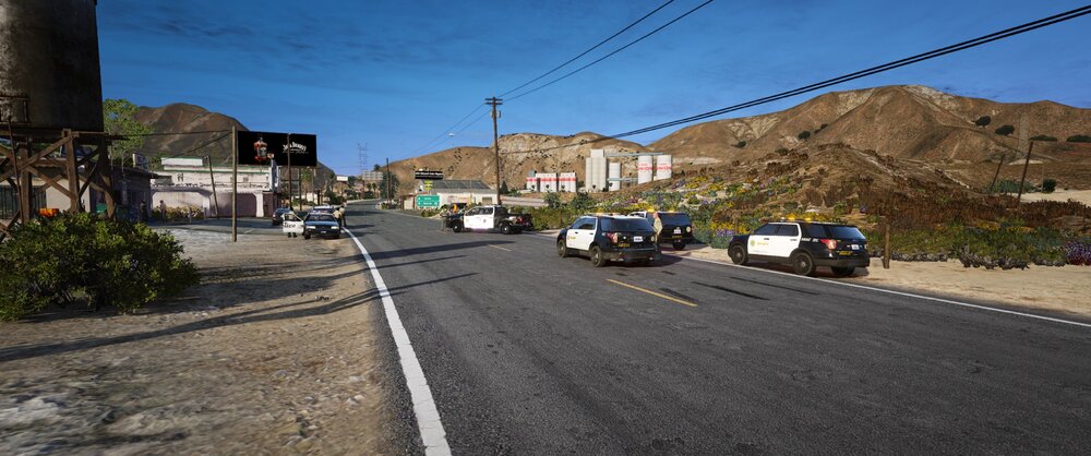 Could contain: outdoor, sky, road, vehicle, land vehicle, car, way, scene, wheel, street, road surface, asphalt, thoroughfare, lane, house, neighbourhood, infrastructure, town, tarmac, mountain, travel