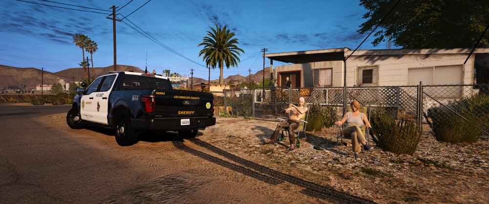 Could contain: outdoor, land vehicle, sky, tree, wheel, ground, tire, car, plant, house, road, travel, vehicle