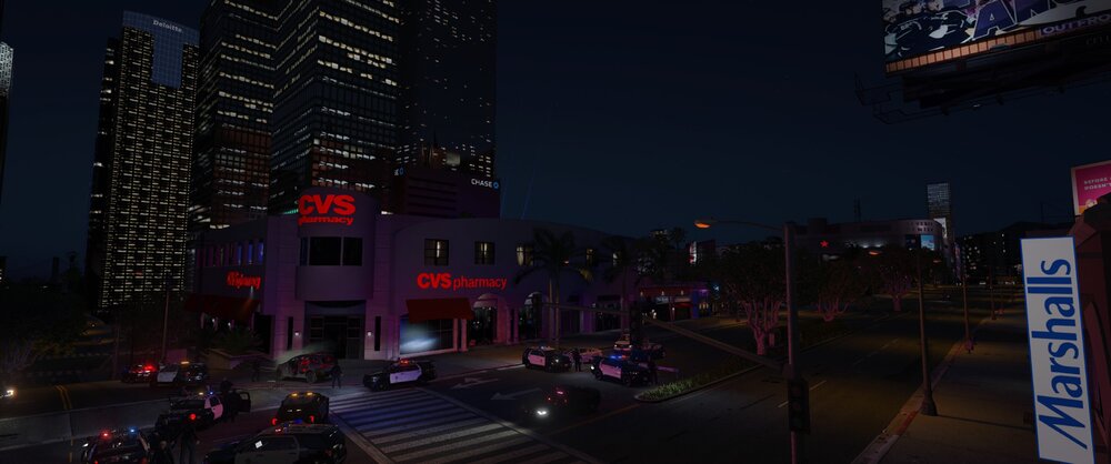 Could contain: outdoor, sky, building, metropolitan area, downtown, night, metropolis, car, skyscraper, urban area, road, street, light, city